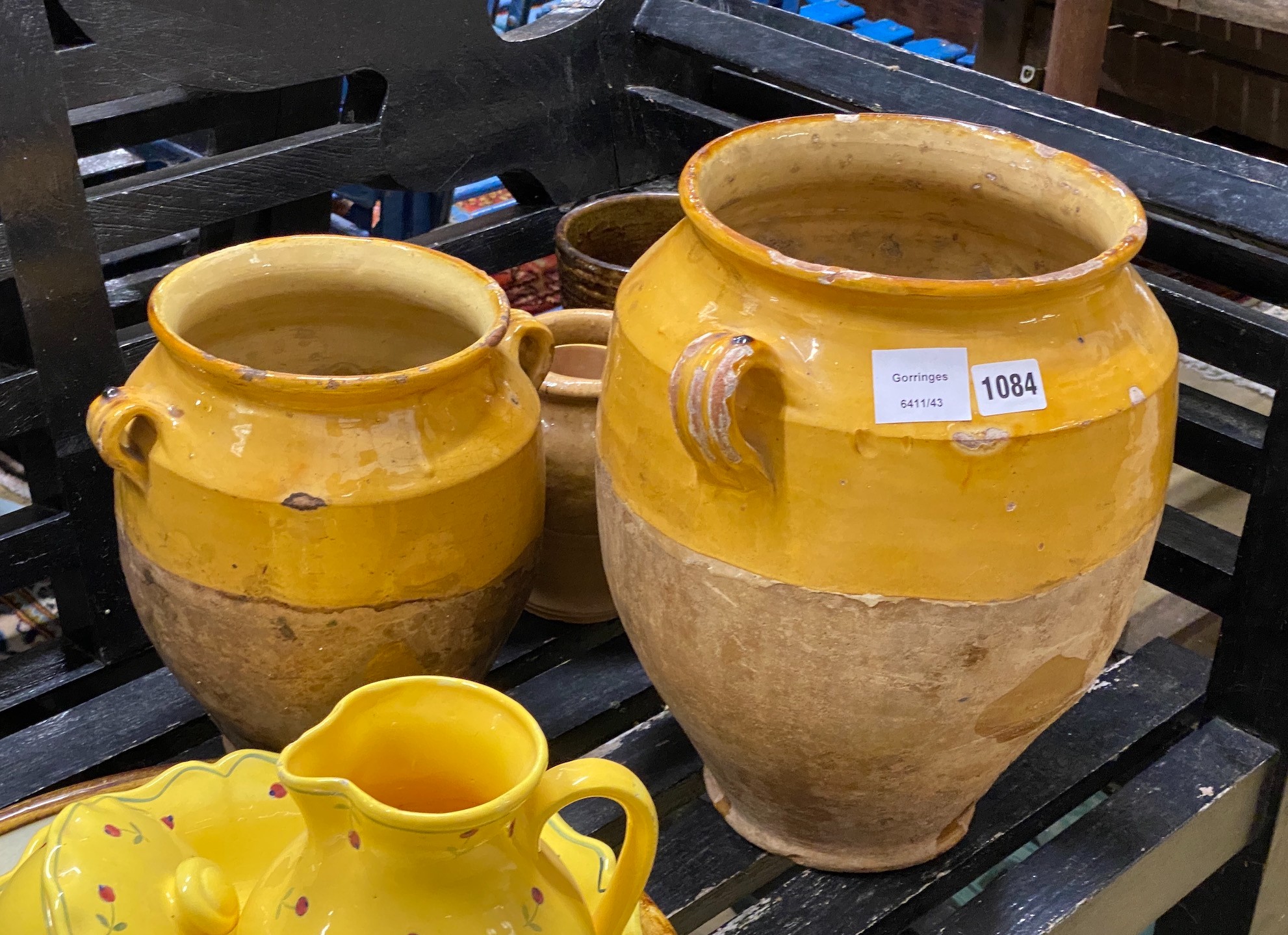Twelve pieces of Continental glazed earthenware, largest 34cm, a bamboo vase, etc.